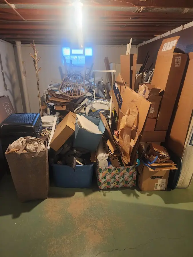 Roll-off dumpster container at job site for 8 Yard Dumpster Rental in Cannon AFB